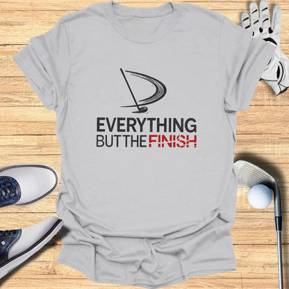 Gray t-shirt with "Everything But the Finish" text and golf imagery.