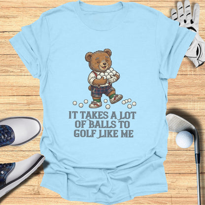 Light blue t-shirt with a cartoon bear holding golf balls and text.