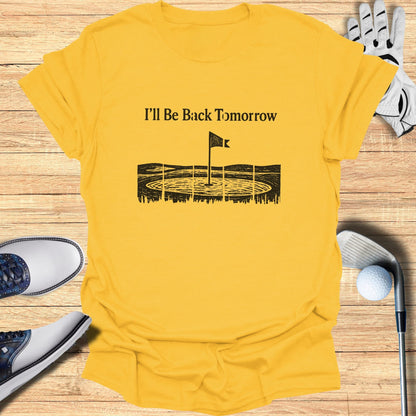 Yellow t-shirt with a golf course graphic and text "I'll Be Back Tomorrow".
