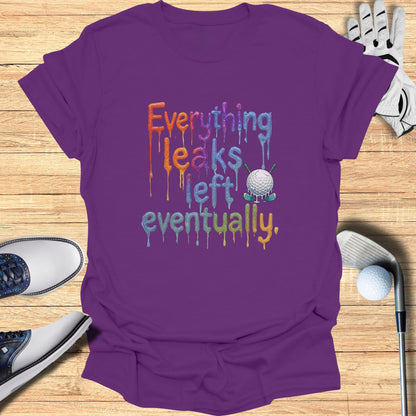 Purple t-shirt with dripping text "Everything leaks eventually" and a golf ball on tee.