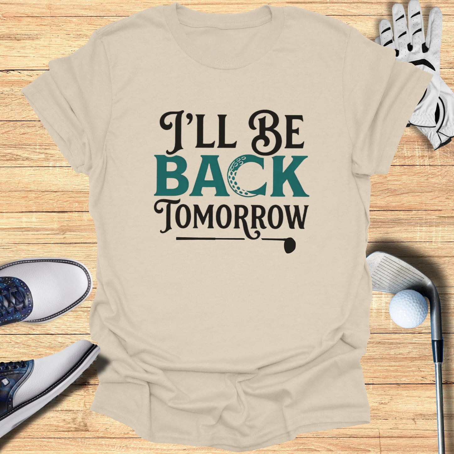 T-shirt with "I'll be back tomorrow" text and golf equipment.