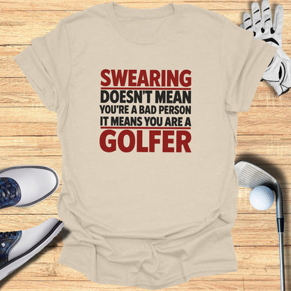 Tan t-shirt with "Swearing Doesn't Mean You're a Bad Person It Means You Are a Golfer" text.