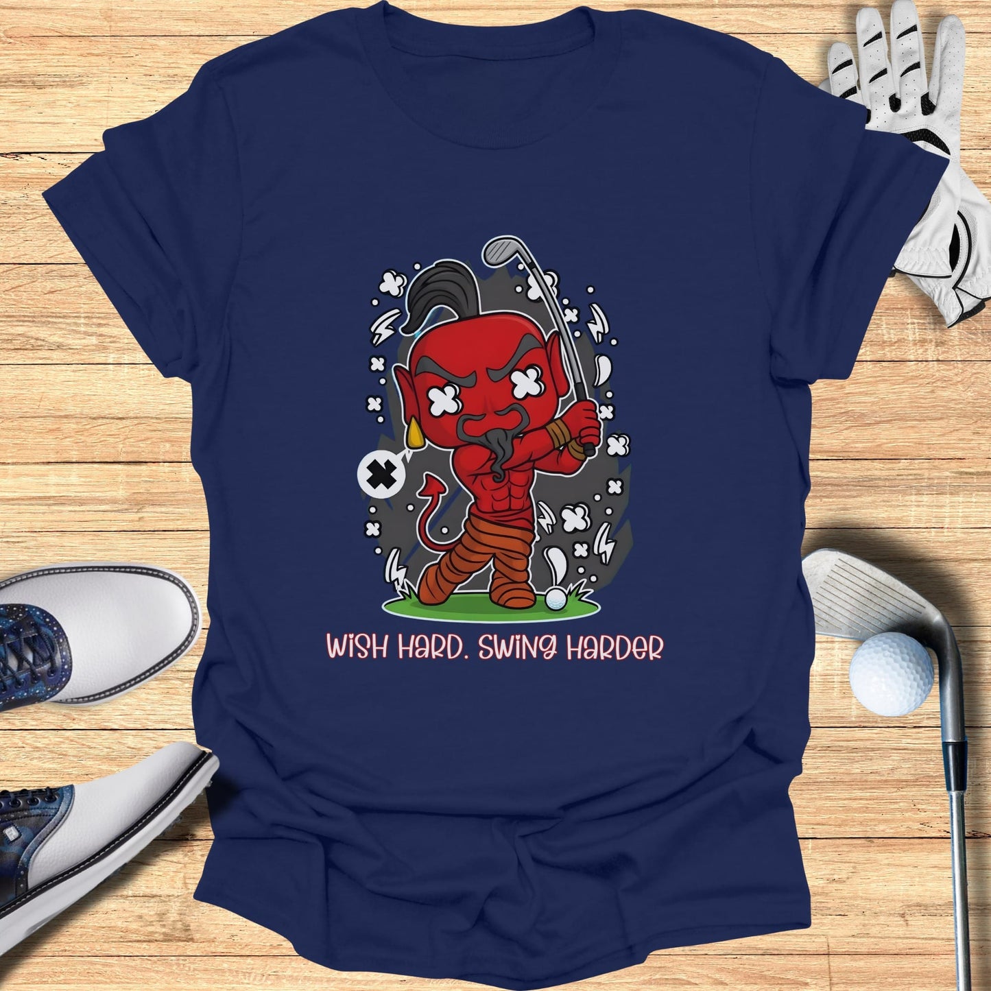 Cartoon devil with golf club and text "WISH HARD. SWING HARDER."