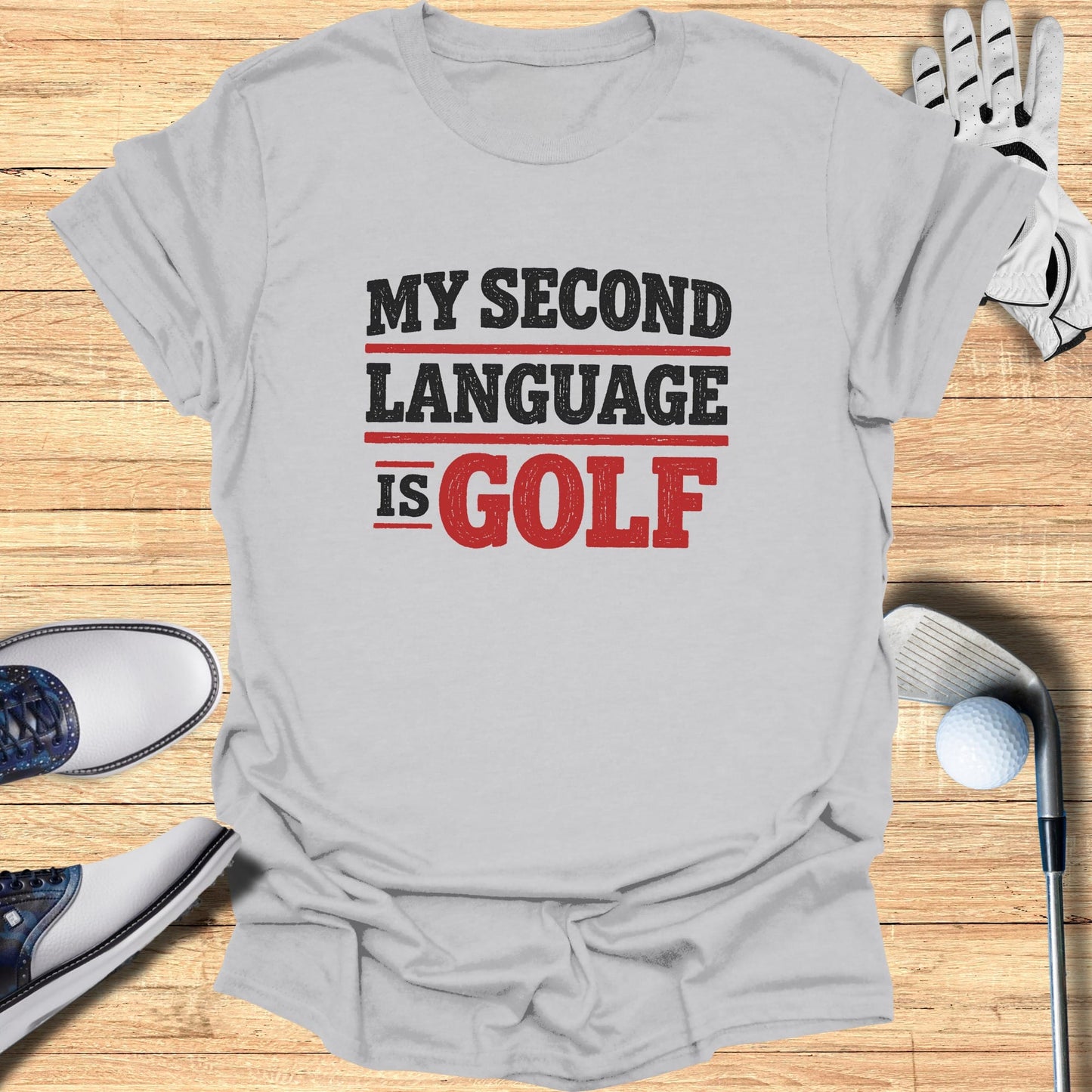 Gray t-shirt with "MY SECOND LANGUAGE IS GOLF" text.
