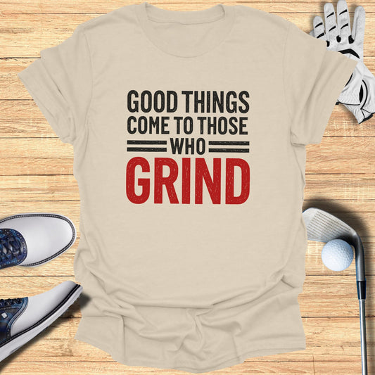 T-shirt with "Good Things Come to Those Who Grind" text, golf clubs, and shoes.