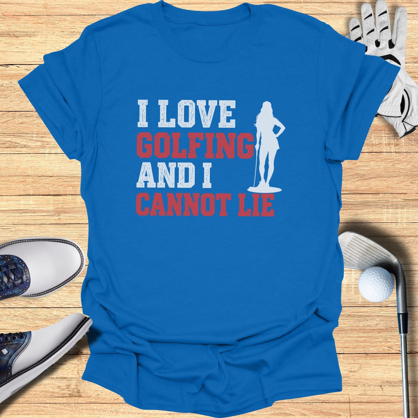 Blue t-shirt with text "I LOVE GOLFING AND I CANNOT LIE" and a golf silhouette.
