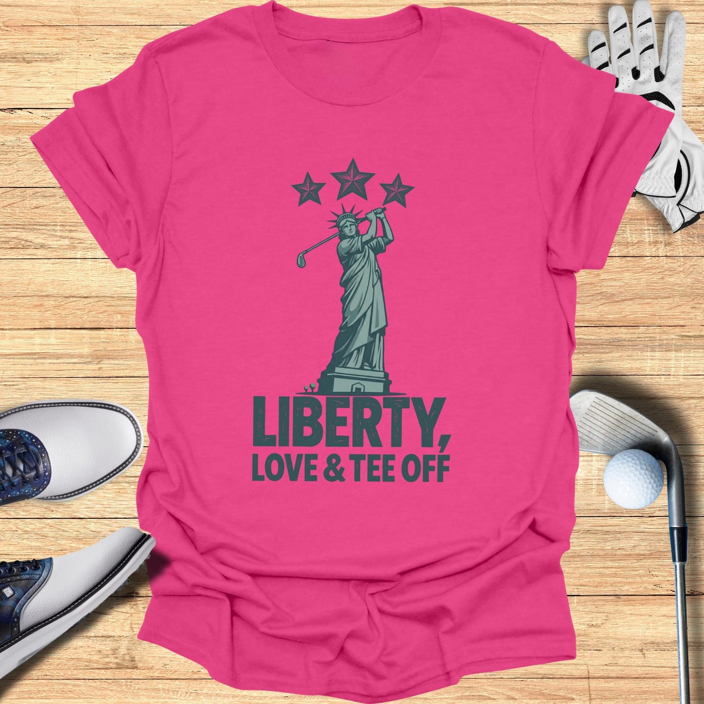 Statue of Liberty swinging golf club with "Liberty, Love & Tee Off" text.