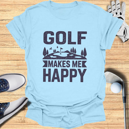 Light blue t-shirt with "GOLF MAKES ME HAPPY" graphic, golf club, and shoes.