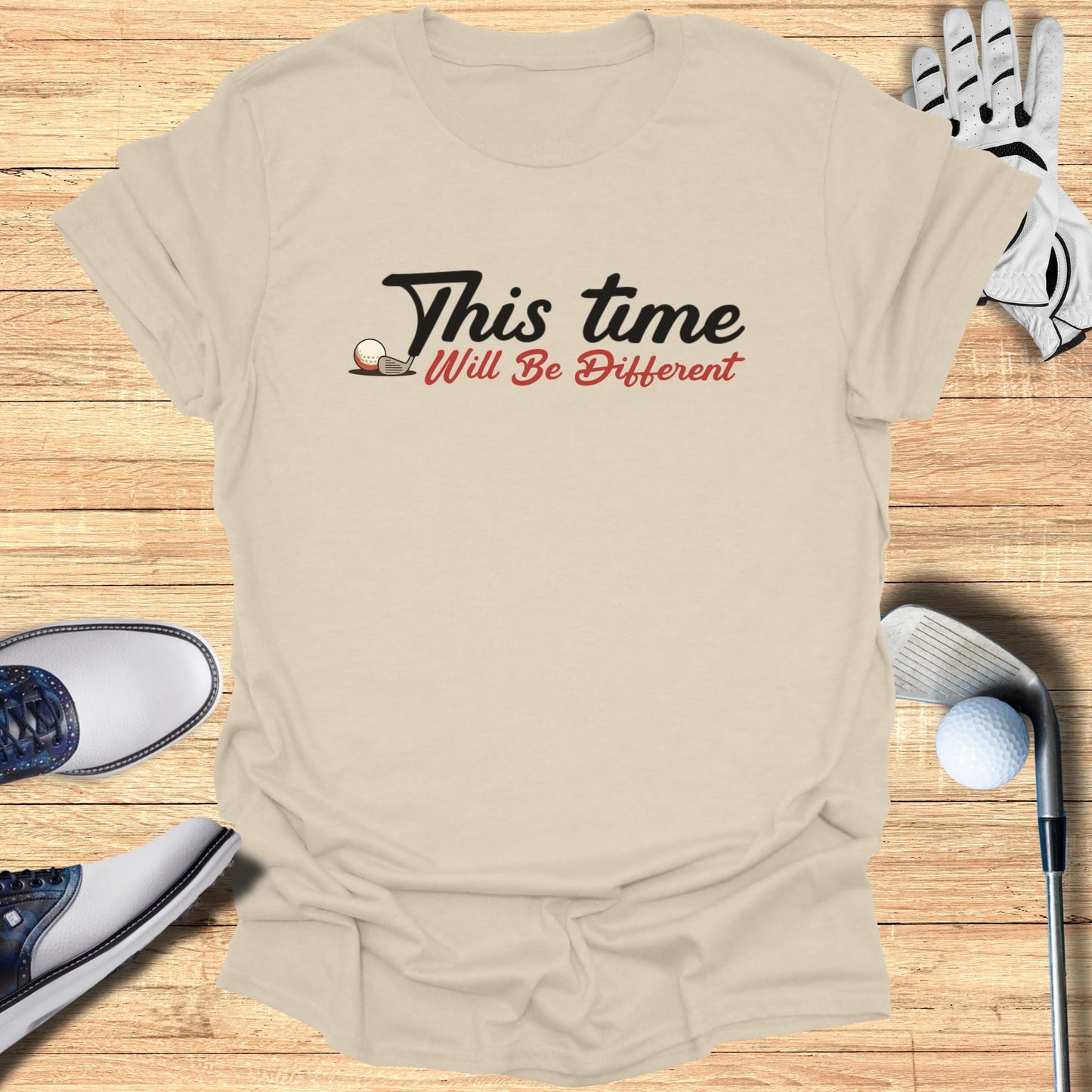 Light beige t-shirt with "This Time Will Be Different" text and golf elements.