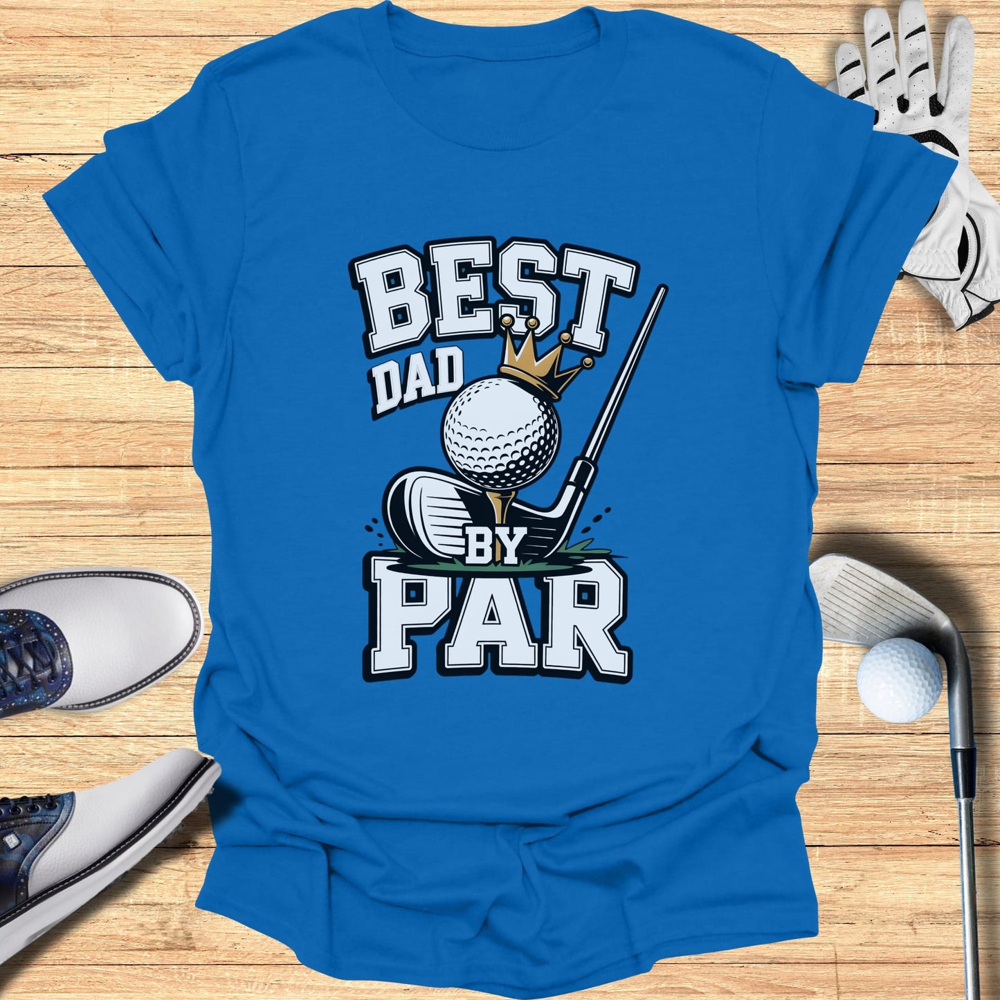 Blue t-shirt with "BEST BY PAR" text, golf ball, and crown graphic.