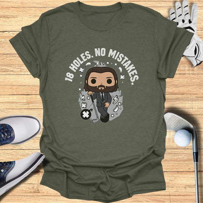 Green t-shirt with cartoon golfer and text "18 HOLES. NO MISTAKES."