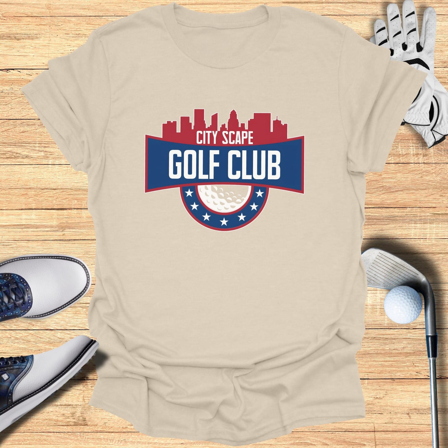 T-shirt with "City Scape Golf Club" logo and golf accessories.