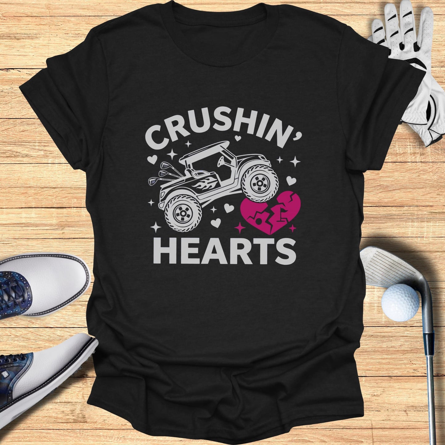 Black t-shirt with "Crushin' Hearts" text and a golf cart graphic.