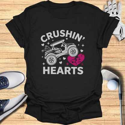 Black t-shirt with "Crushin' Hearts" text and a golf cart graphic.