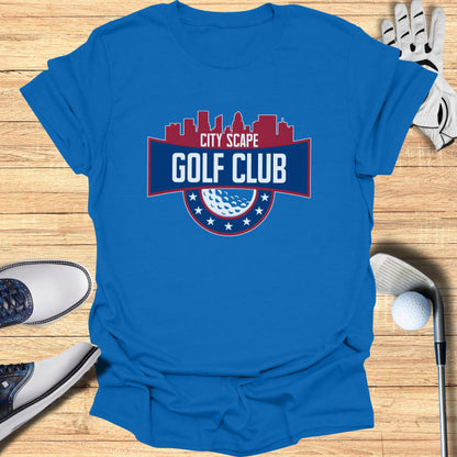 Blue t-shirt with "City Scape Golf Club" logo and golf accessories.
