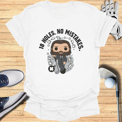 White t-shirt with cartoon golfer and text "18 HOLES. NO MISTAKES."