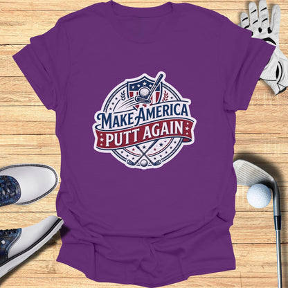 Purple t-shirt with "Make America Putt Again" golf graphic.
