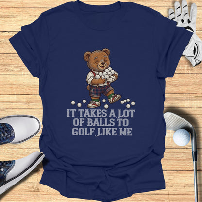 Bear wearing golf attire holding many golf balls, text reads "It takes a lot of balls to golf like me."