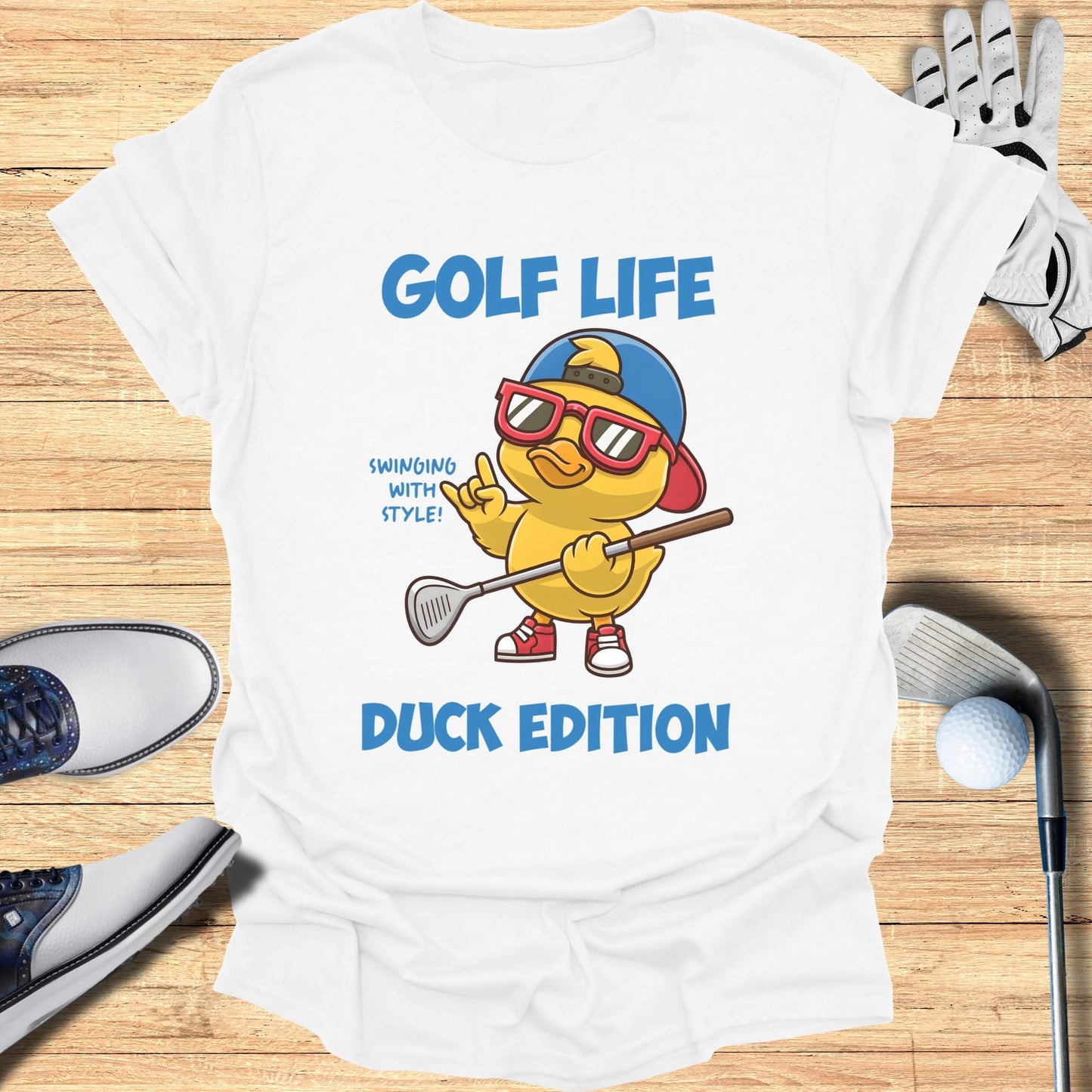 T-shirt with cartoon duck in sunglasses holding golf club.