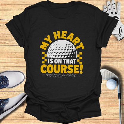 Black t-shirt with "My Heart Is On That Course!" and a golf ball graphic.