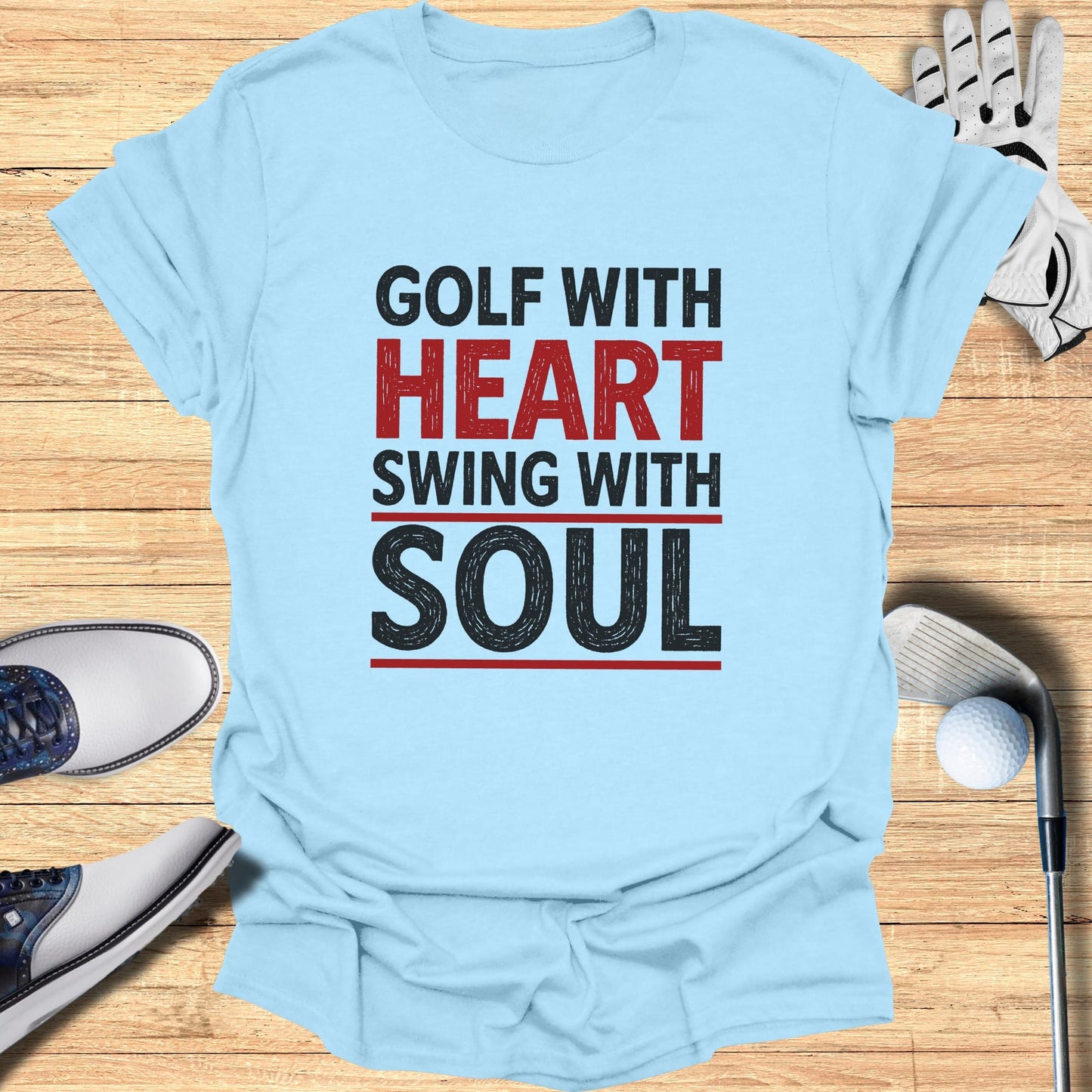 Light blue t-shirt with "Golf with Heart Swing with Soul" text.