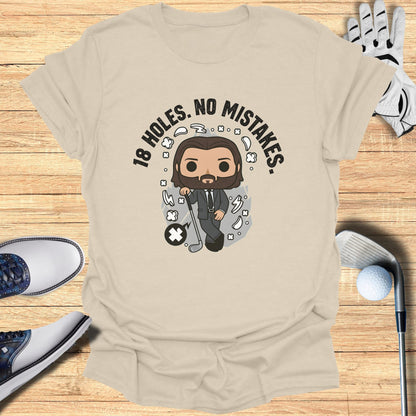 T-shirt with cartoon man, golf club, and text "18 HOLES. NO MISTAKES."