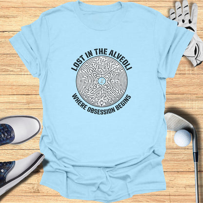 Light blue t-shirt with maze graphic and text "LOST IN THE ALVEOLI WHERE OBSESSION BEGINS".