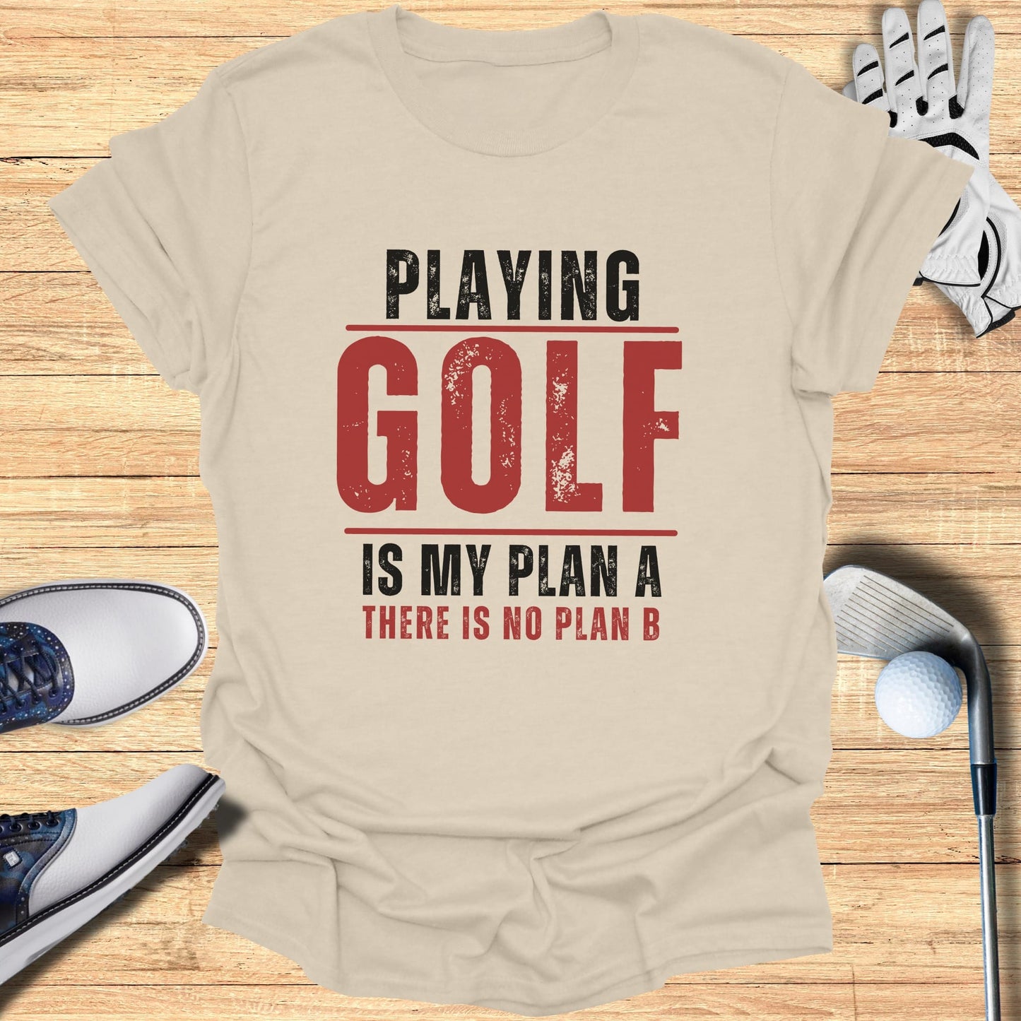 Cream t-shirt with "PLAYING GOLF IS MY PLAN A THERE IS NO PLAN B" in red text.