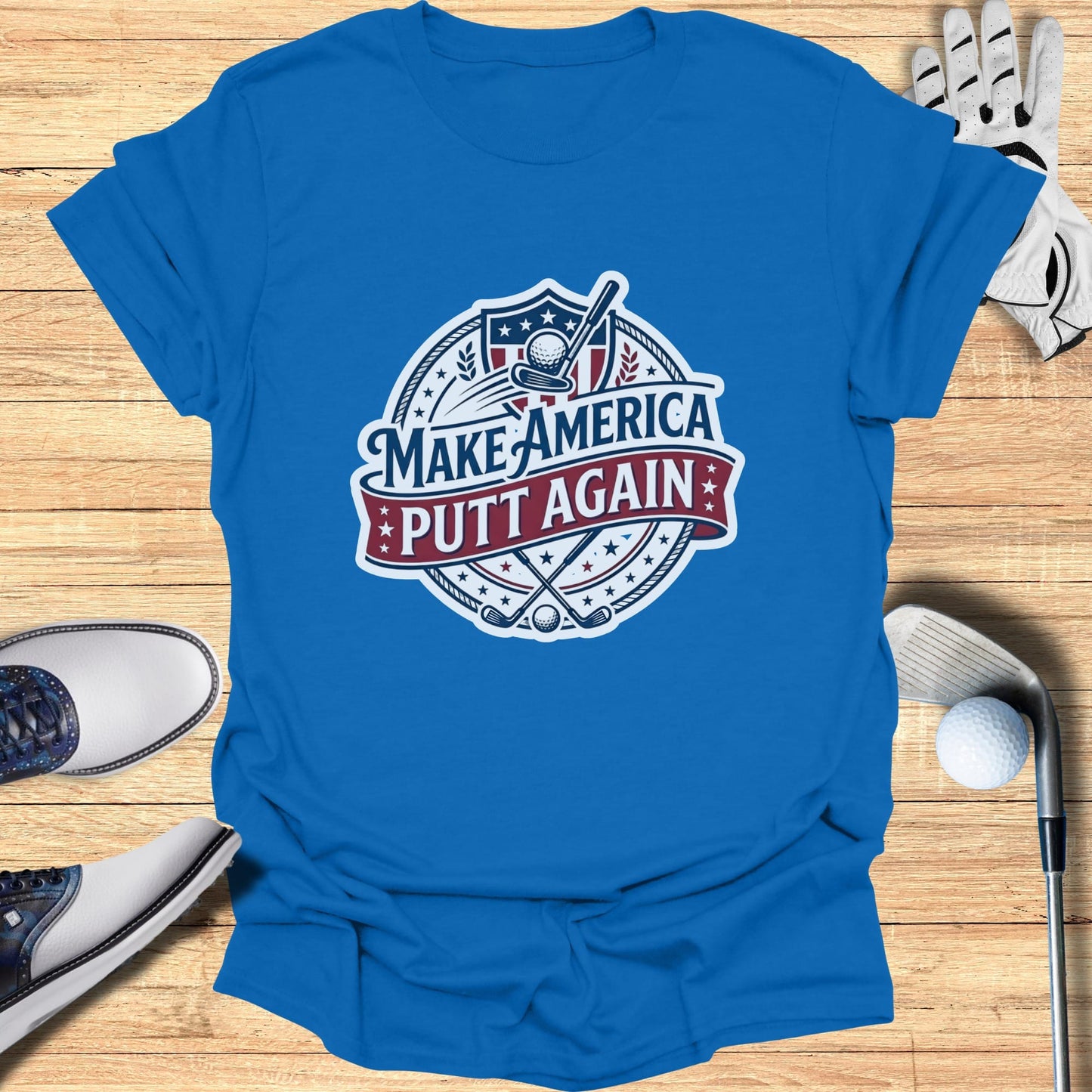Blue t-shirt with "Make America Putt Again" golf-themed logo.